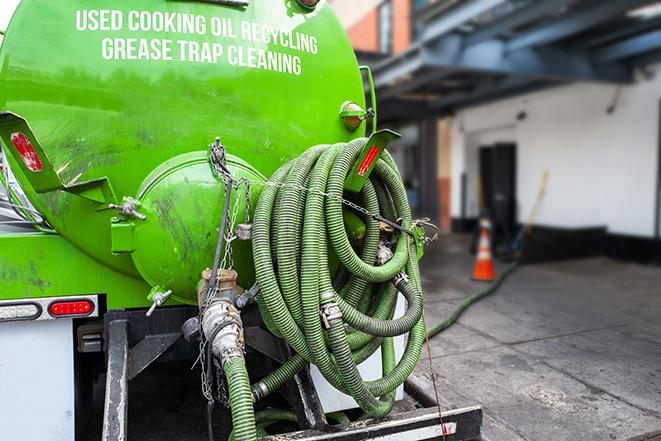 grease trap being pumped at a restaurant kitchen in Edgewood